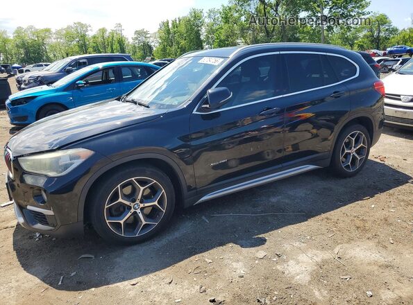 WBXHT3C32H5F72788 2017 BMW X1 Черный Передняя левая четверть