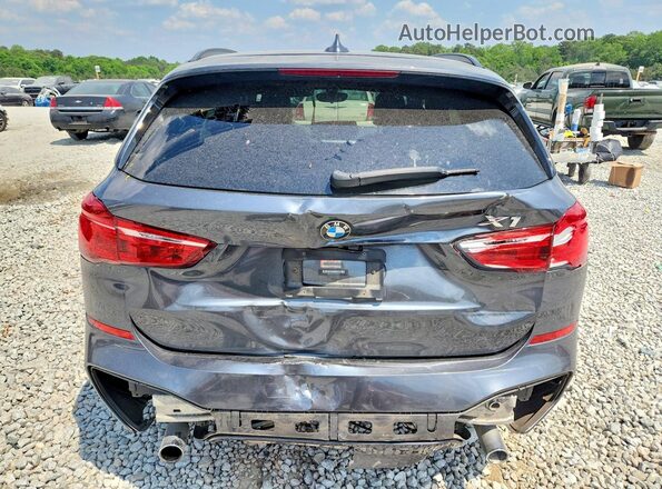 WBXHT3C32J5F93131 2018 BMW X1 Gray უკანა ხედი