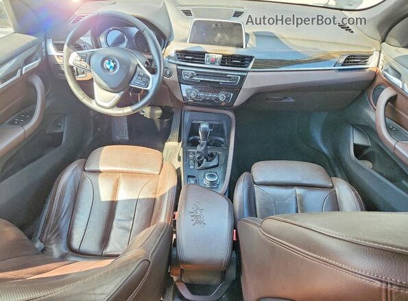 WBXHT3C32J5L27816 2018 BMW X1 Черный Вид панели приборов