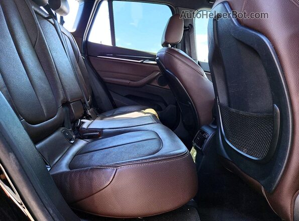 WBXHT3C32J5L27816 2018 BMW X1 Черный Вид задней части салона