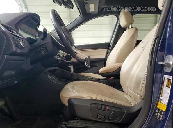 WBXHT3C33GP883260 2016 BMW X1 Blue Vista interior delantera