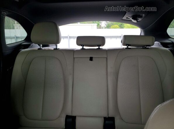 WBXHT3C33GP883260 2016 BMW X1 Blue Vista de los asientos traseros