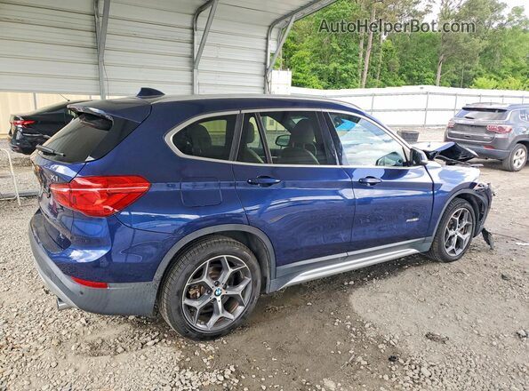 WBXHT3C33GP883260 2016 BMW X1 Blue Trasero derecho