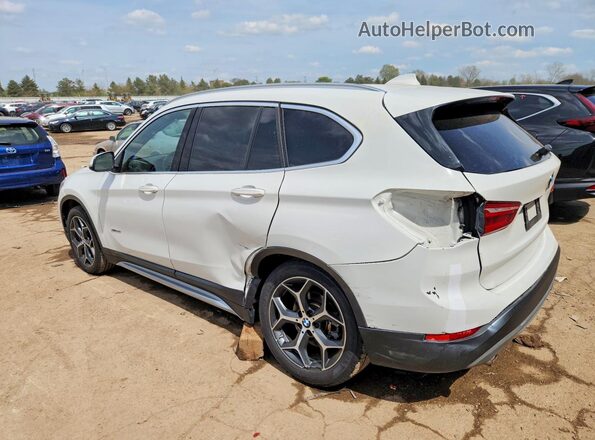 WBXHT3C34H5F70119 2017 BMW X1 White Trasero izquierdo