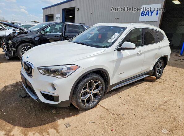 WBXHT3C34H5F70119 2017 BMW X1 White Vista tres cuartos delantera izquierda