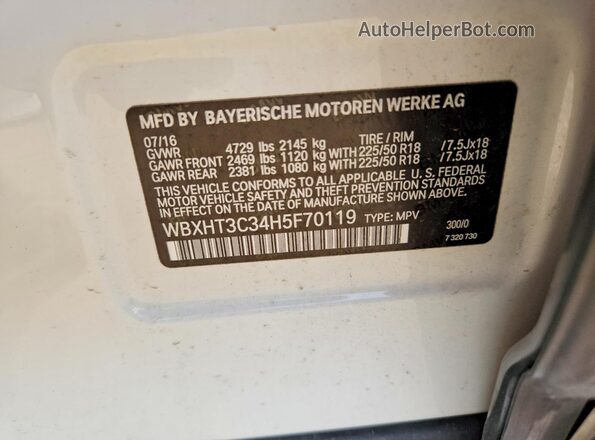 WBXHT3C34H5F70119 2017 BMW X1 White Vista del compartimento del motor