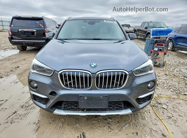 WBXHT3C34H5F76017 2017 BMW X1 Gray Դիմացի տեսք