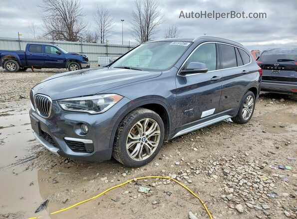 WBXHT3C34H5F76017 2017 BMW X1 Gray Առջևի ձախ երեք քառորդ տեսարան