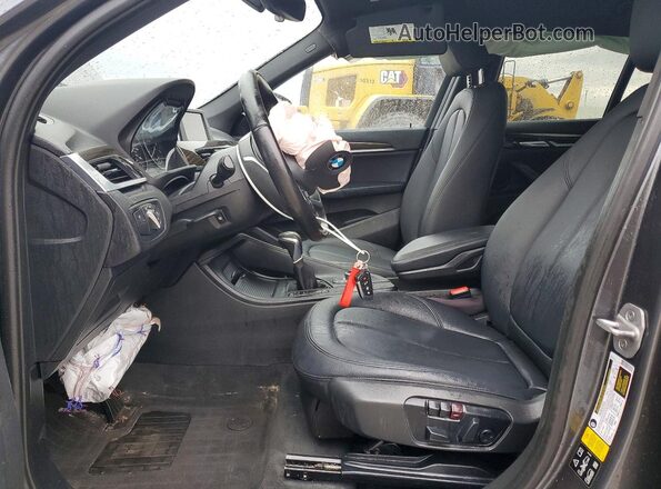 WBXHT3C34H5F85185 2017 BMW X1 Gray Սալոնի դիմացի տեսք