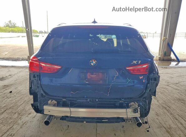 WBXHT3C34J5F92286 2018 BMW X1 Blue Vista trasera