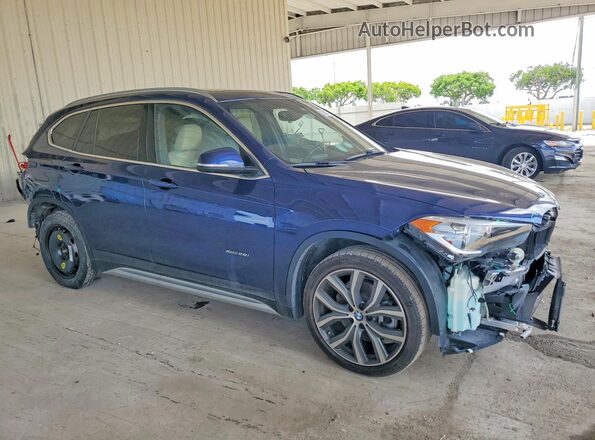 WBXHT3C34J5F92286 2018 BMW X1 Blue Delantero derecho