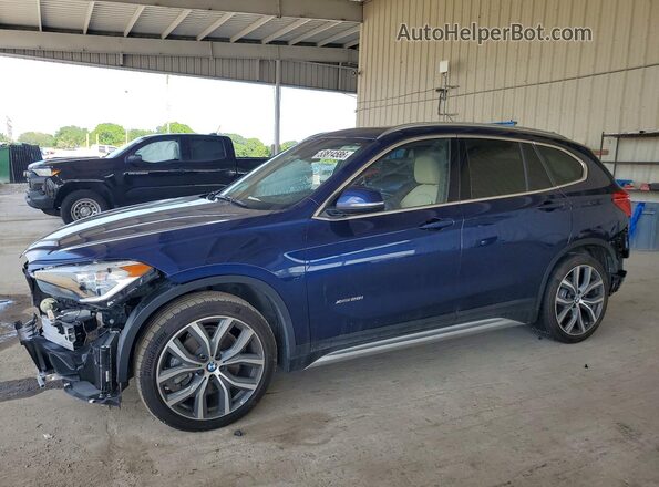 WBXHT3C34J5F92286 2018 BMW X1 Blue Vista tres cuartos delantera izquierda