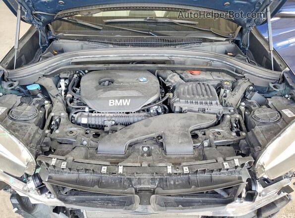 WBXHT3C34J5F92286 2018 BMW X1 Blue Vista del compartimento del motor