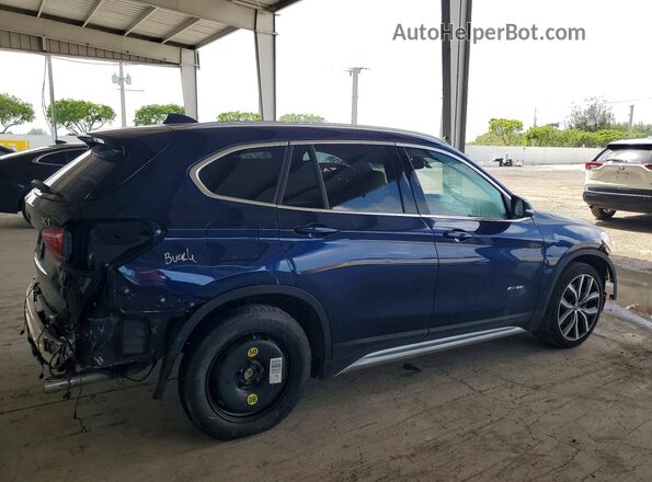 WBXHT3C34J5F92286 2018 BMW X1 Blue Trasero derecho