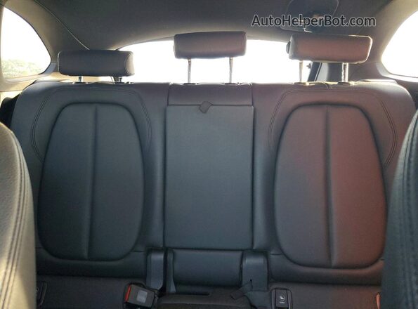 WBXHT3C34J5F92921 2018 BMW X1 Black Vista de los asientos traseros