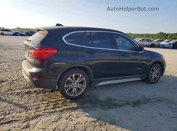 WBXHT3C34J5F92921 2018 BMW X1 Black Trasero derecho