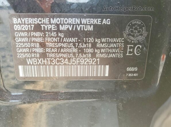 WBXHT3C34J5F92921 2018 BMW X1 Black Vista de la etiqueta del VIN