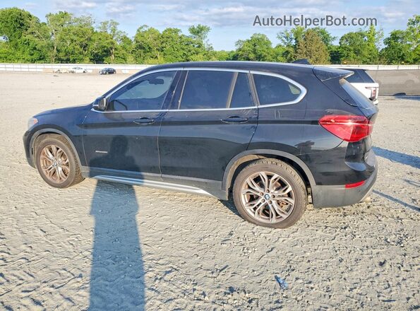 WBXHT3C34J5F92921 2018 BMW X1 Black Trasero izquierdo