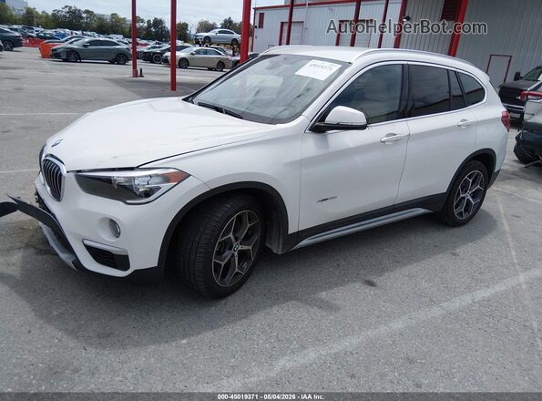 WBXHT3C34J5K22713 2018 BMW X1 White Առջևի ձախ երեք քառորդ տեսարան