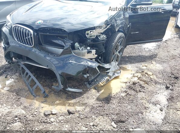 WBXHT3C34J5L26666 2018 BMW X1 Черный Вид спереди