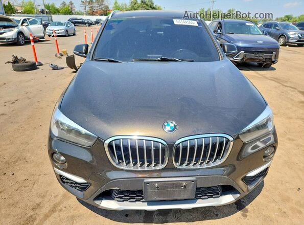 WBXHT3C34J5L27008 2018 BMW X1 Black Դիմացի տեսք
