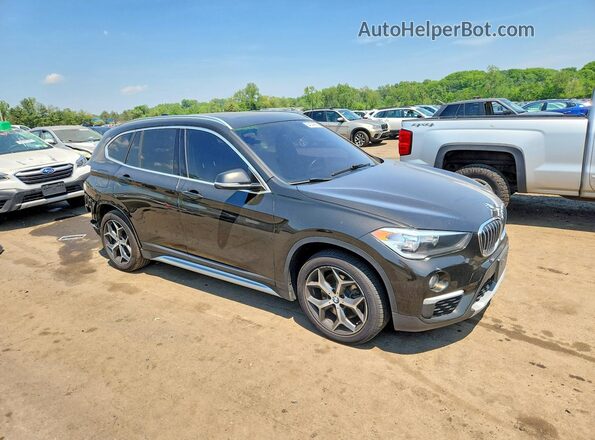 WBXHT3C34J5L27008 2018 BMW X1 Black Առջևի աջ