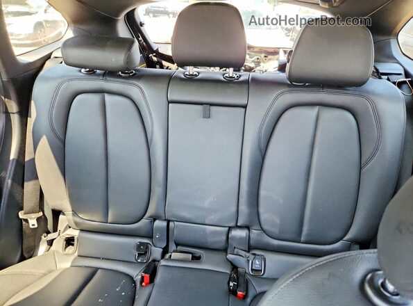 WBXHT3C34J5L27008 2018 BMW X1 Black Հետևի նստատեղերի տեսք