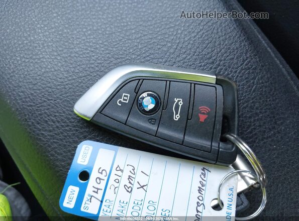 WBXHT3C34J5L27977 2018 BMW X1 Blue Вид панелі приладів