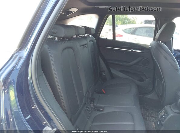 WBXHT3C34J5L27977 2018 BMW X1 Blue Вид наклейки з VIN-кодом