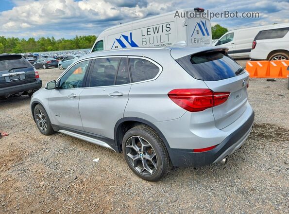 WBXHT3C35GP881266 2016 BMW X1 Silver Trasero izquierdo