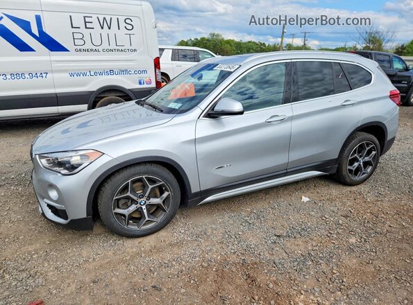 WBXHT3C35GP881266 2016 BMW X1 Silver Vista tres cuartos delantera izquierda