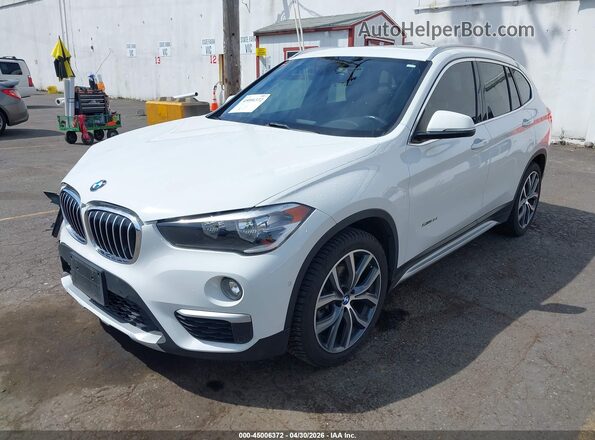 WBXHT3C35H5F69951 2017 BMW X1 Белый Передняя левая четверть