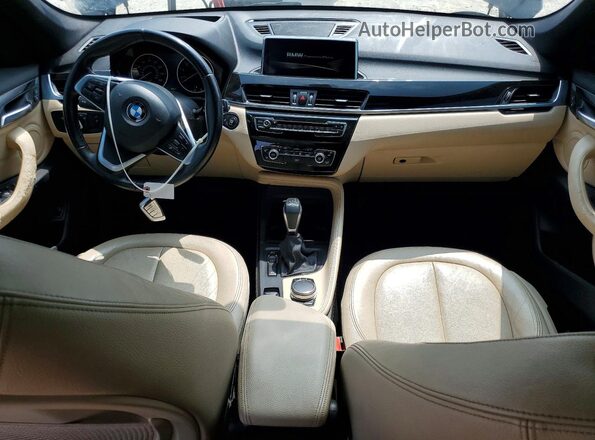 WBXHT3C35H5F75779 2017 BMW X1 Черный Вид панели приборов
