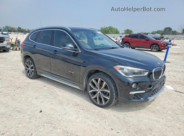 WBXHT3C35H5F75779 2017 BMW X1 Черный Передняя правая четверть