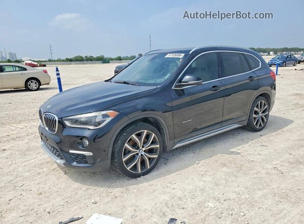 WBXHT3C35H5F75779 2017 BMW X1 Черный Передняя левая четверть