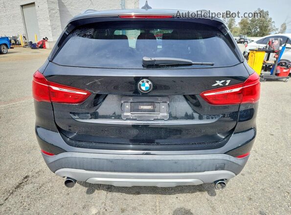 WBXHT3C36GP880188 2016 BMW X1 Black Widok z tyłu