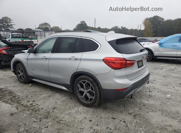 WBXHT3C36GP880899 2016 BMW X1 Silver Trasero izquierdo