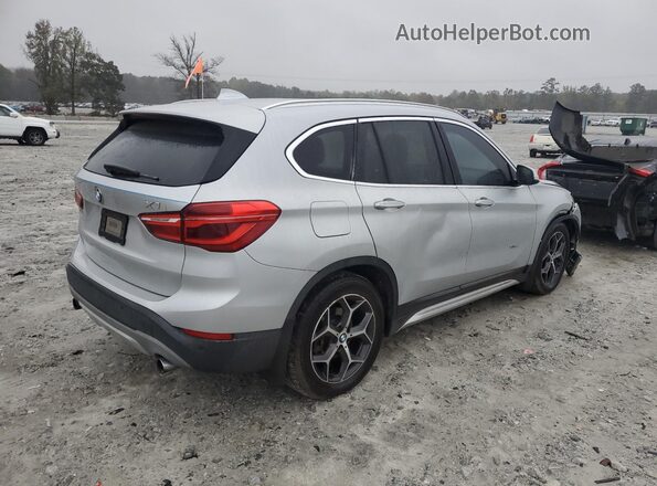 WBXHT3C36GP880899 2016 BMW X1 Silver Trasero derecho