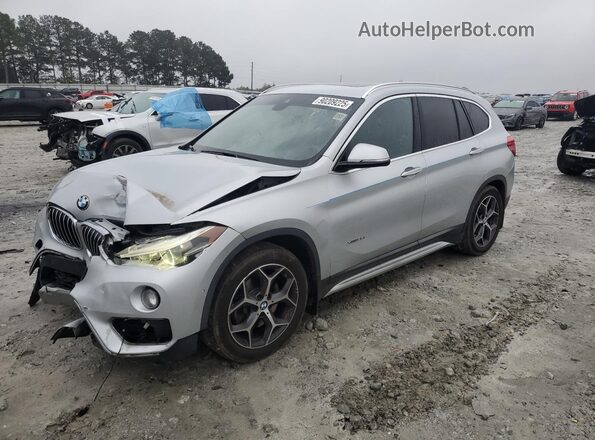 WBXHT3C36GP880899 2016 BMW X1 Silver Vista tres cuartos delantera izquierda