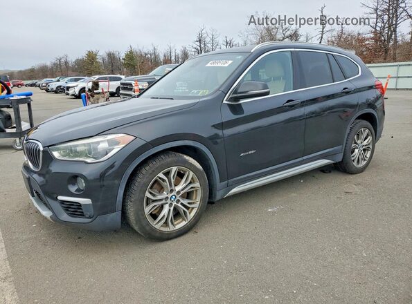 WBXHT3C36H5F76732 2017 BMW X1 Черный Передняя левая четверть