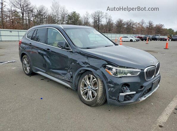 WBXHT3C36H5F76732 2017 BMW X1 Черный Передняя правая четверть