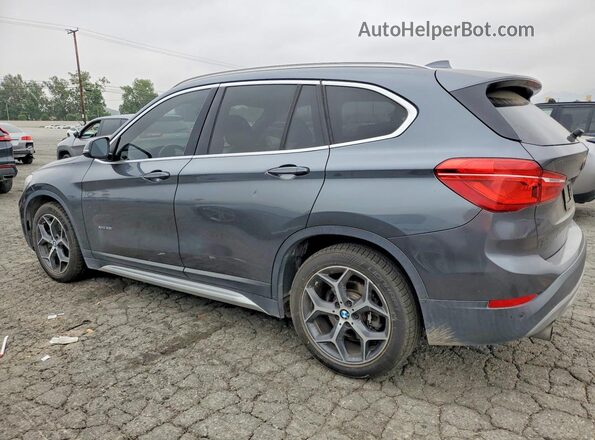 WBXHT3C36H5F84264 2017 BMW X1 Gray Trasero izquierdo