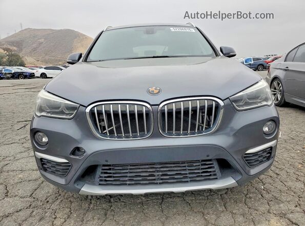 WBXHT3C36H5F84264 2017 BMW X1 Gray Vista frontal
