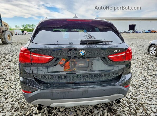 WBXHT3C38H5F72150 2017 BMW X1 Черный Вид сзади