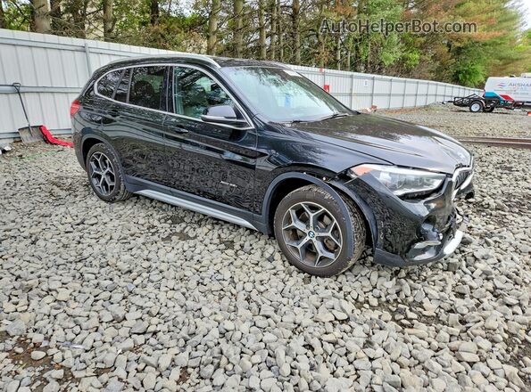 WBXHT3C38H5F72150 2017 BMW X1 Черный Передняя правая четверть
