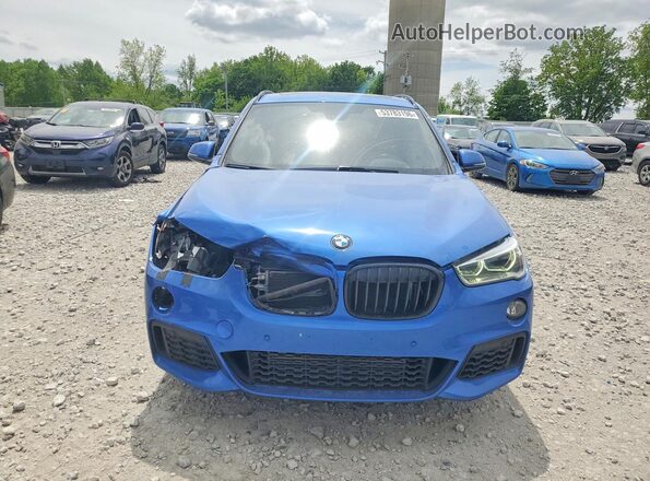 WBXHT3C38H5F77378 2017 BMW X1 Синий Вид спереди