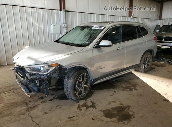 WBXHT3C38H5F79633 2017 BMW X1 Silver Front left