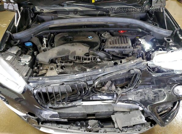 WBXHT3C38J3H33694 2018 BMW X1 Black Vista interior trasera