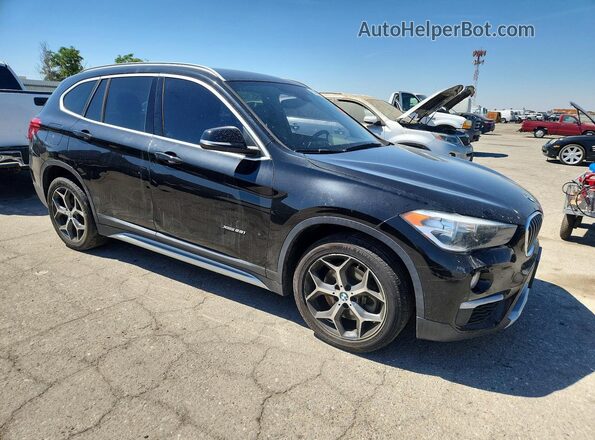 WBXHT3C38J5K28093 2018 BMW X1 Black Delantero derecho