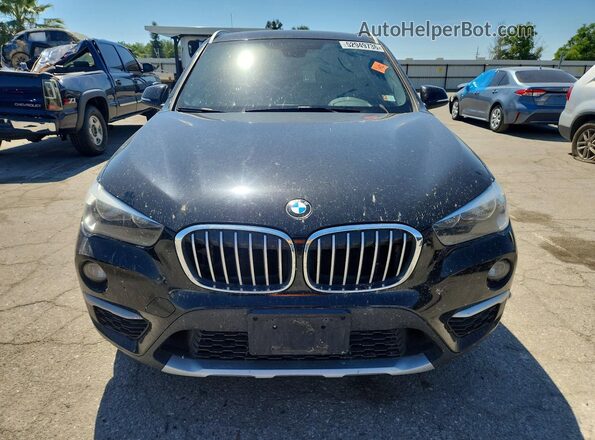 WBXHT3C38J5K28093 2018 BMW X1 Black Vista frontal